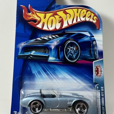 hot wheels 1:64 diecast car in packaging blue card front view silver sports car collectible