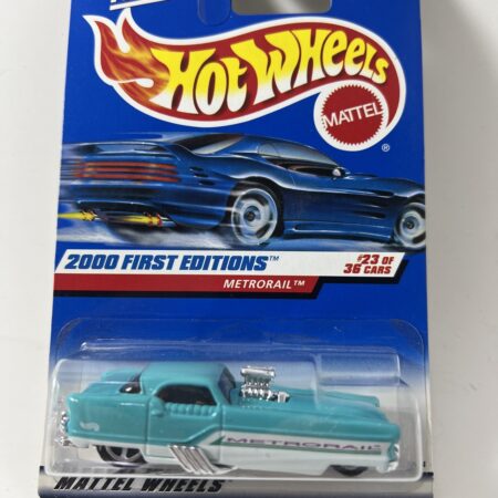 hot wheels 2000 first editions diecast car in packaging blue card front view turquoise pickup collectible