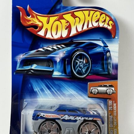 hot wheels diecast car in packaging blue card front view classic white car collectible