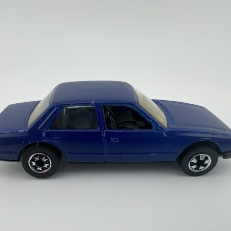 blue sedan diecast car vintage toy side view left profile classic model