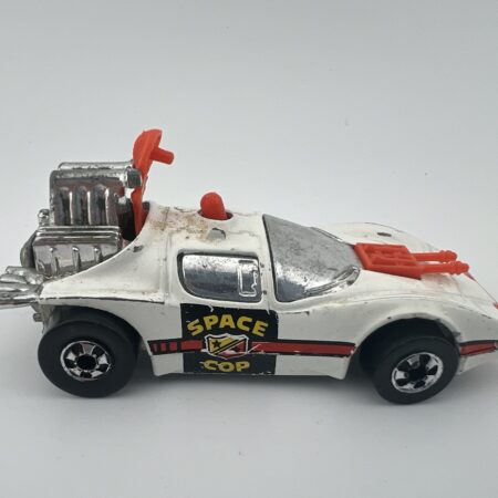 white dune buggy space cop diecast car exposed engine side view left profile vintage toy