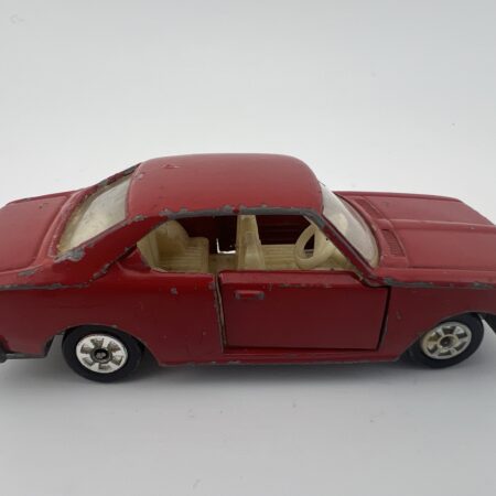 red vintage sedan diecast car side view right profile classic toy