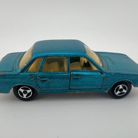 blue vintage sedan diecast car side view left profile classic toy model