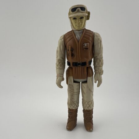 vintage action figure front view tan outfit helmet brown vest collectible figure