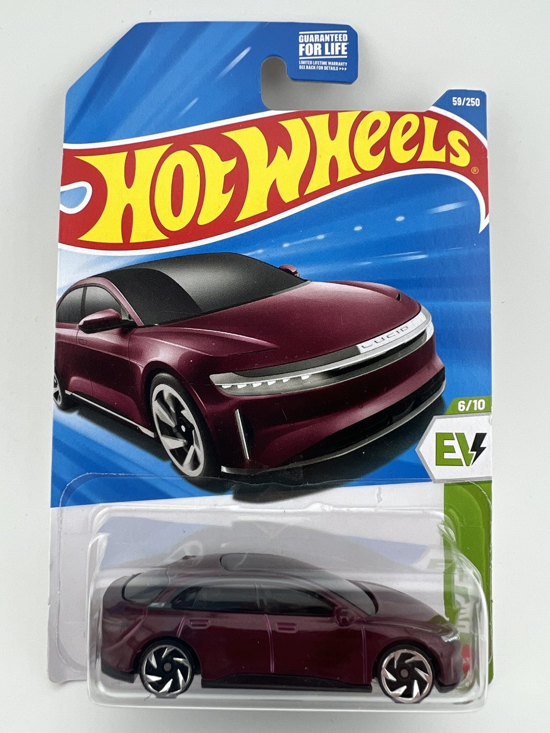 Hot Wheels Lucid Air HW EV diecast car in original packaging with electric vehicle theme and Mattel branding, 1:64 scale collectible