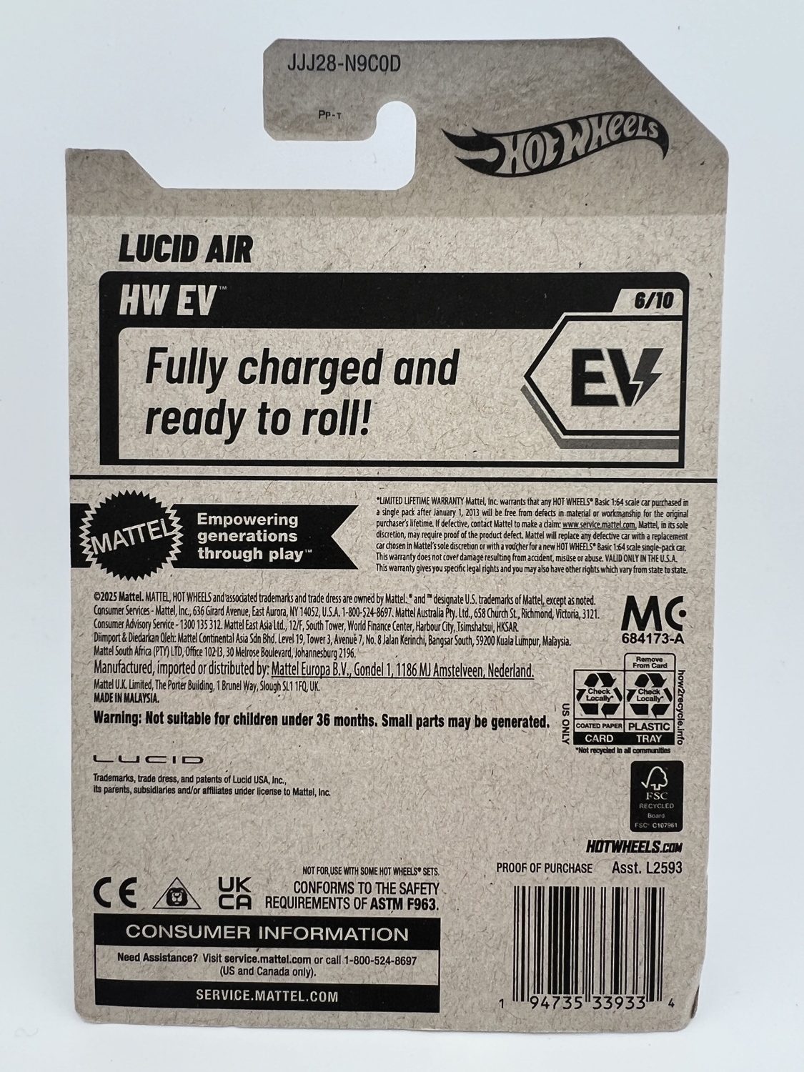 Back of Hot Wheels Lucid Air HW EV packaging showing Mattel branding, product details, barcode, and safety information