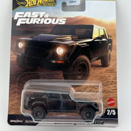 Hot Wheels Premium Fast and Furious Lamborghini LM002 diecast car in original packaging with movie themed artwork, 1:64 scale collectible