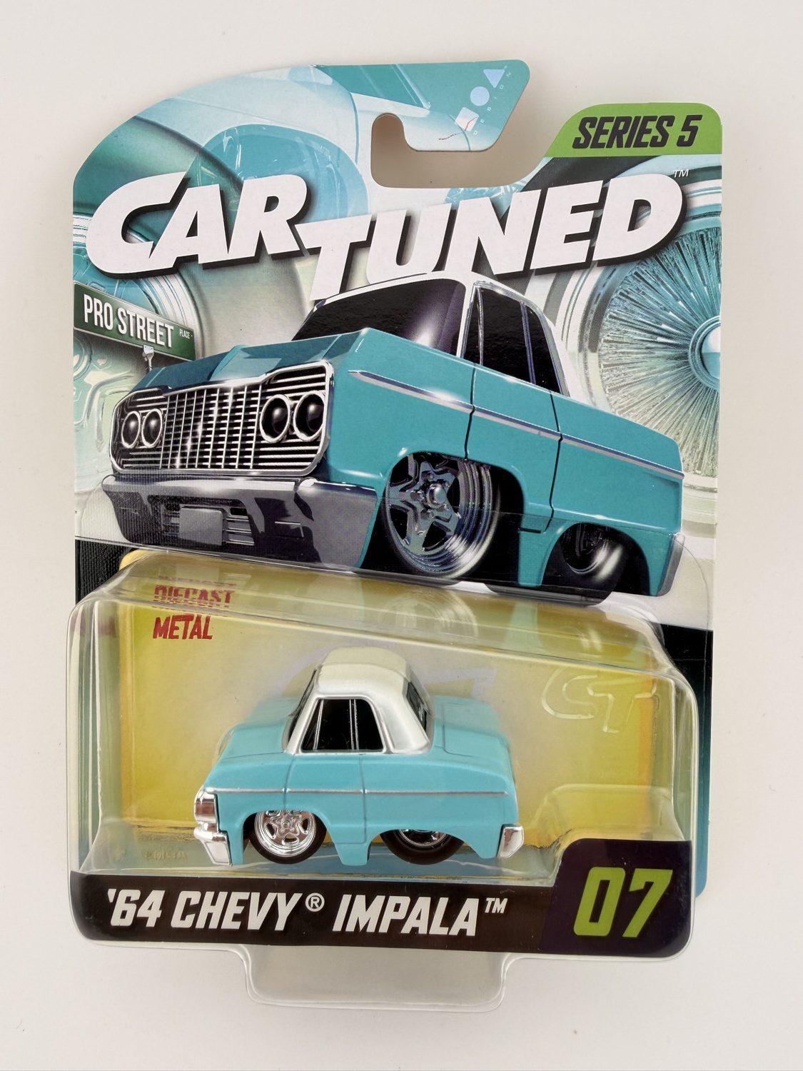 Cartuned 64 Chevy Impala diecast Series 5 car in packaging