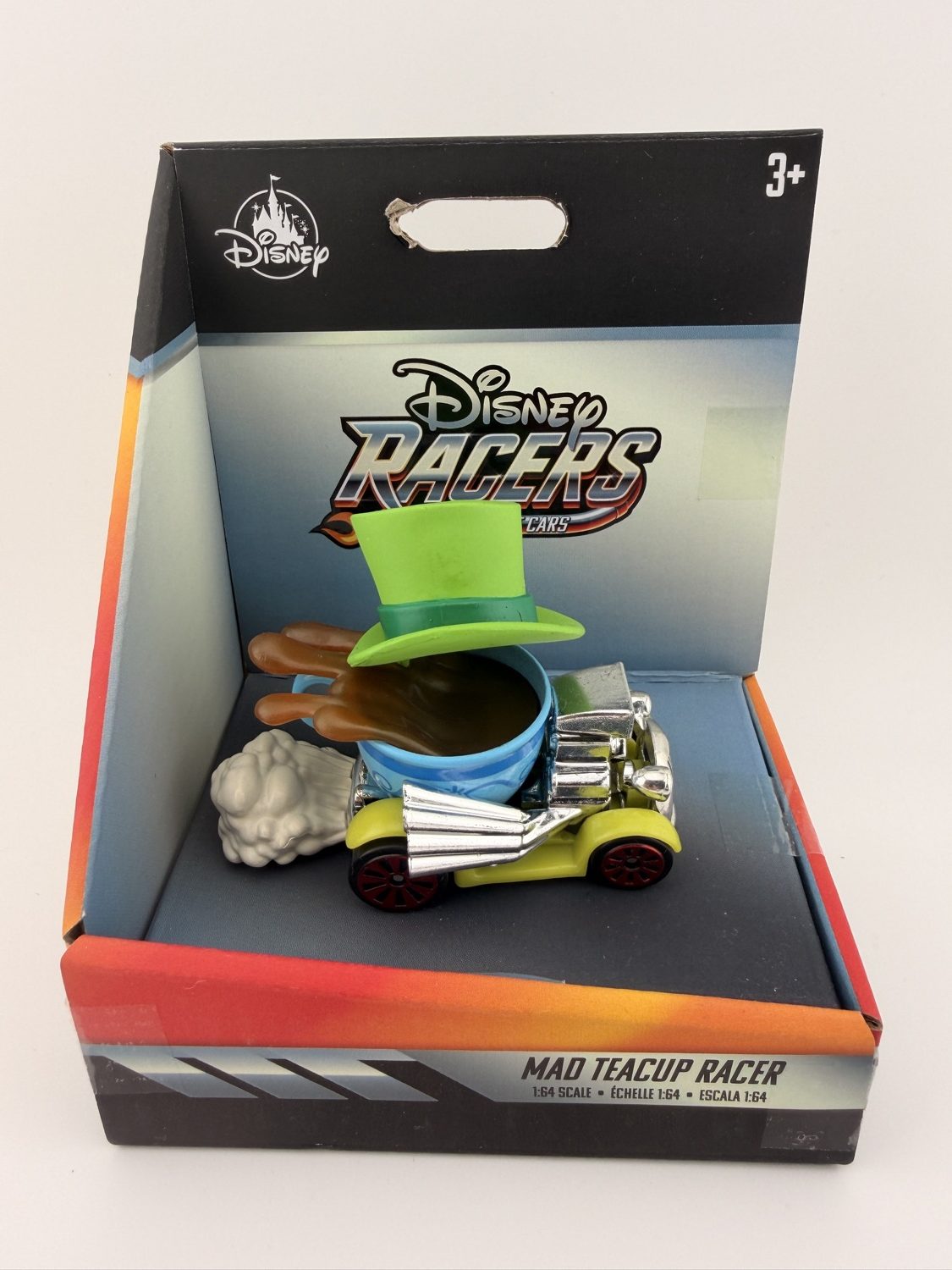 Disney Racers Mad Teacup Racer diecast car with Mad Hatter hat in display packaging
